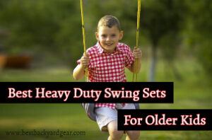best heavy duty swing sets for older kids - post title image showing older boy on swing