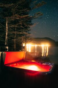 hot tub glowing orange on a starry night